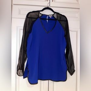 Blue blouse with sheer black sleeve